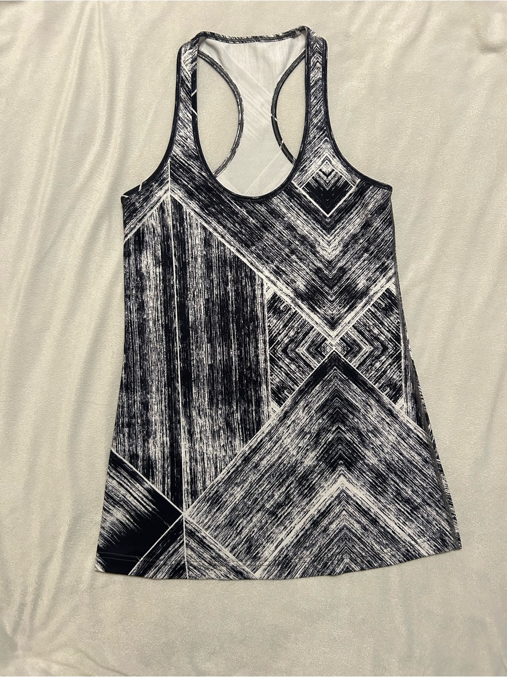 Excellent condition LuLuLemon size 10 Black & White Geometric Racerback Tank Top